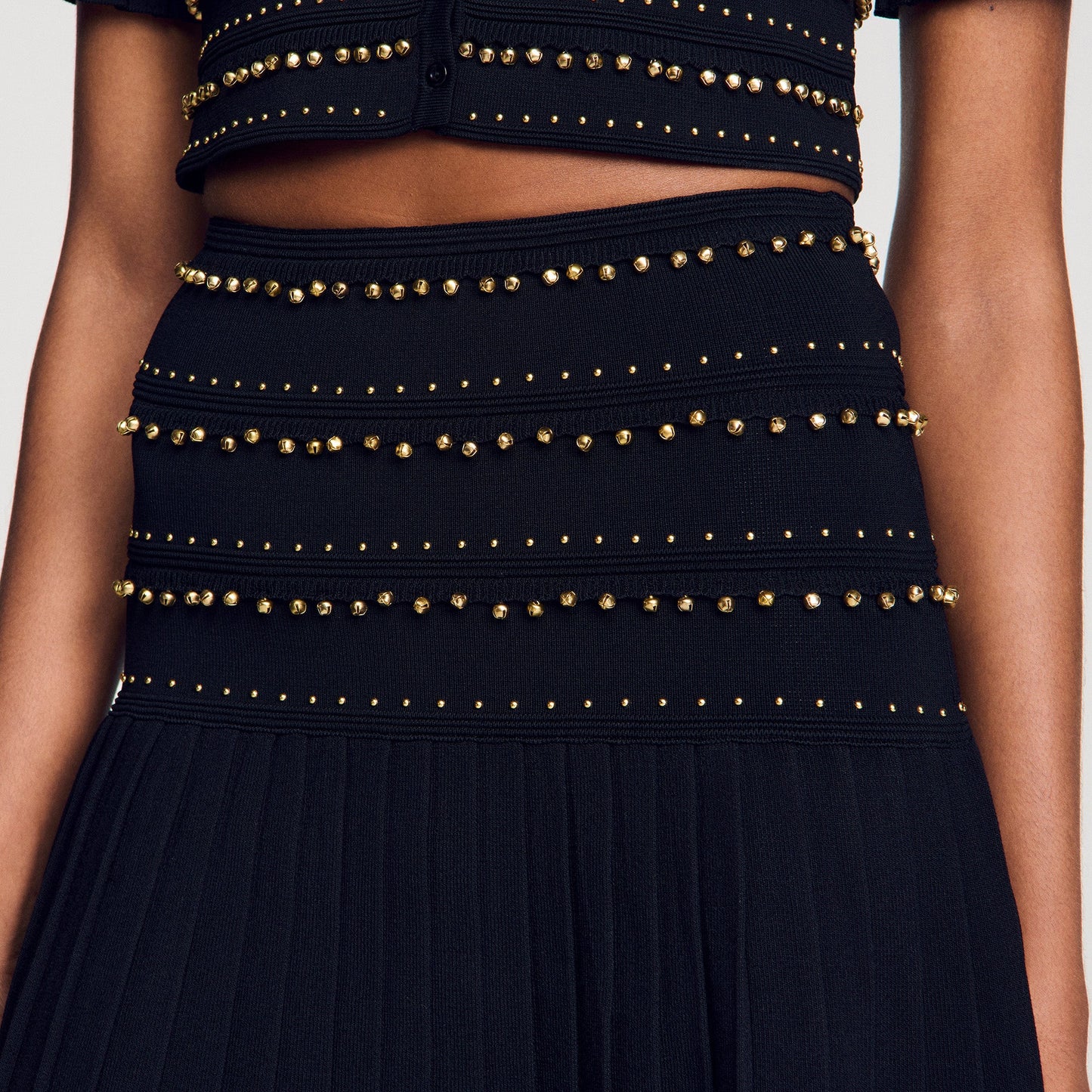 Loria Short skirt with tassels Black