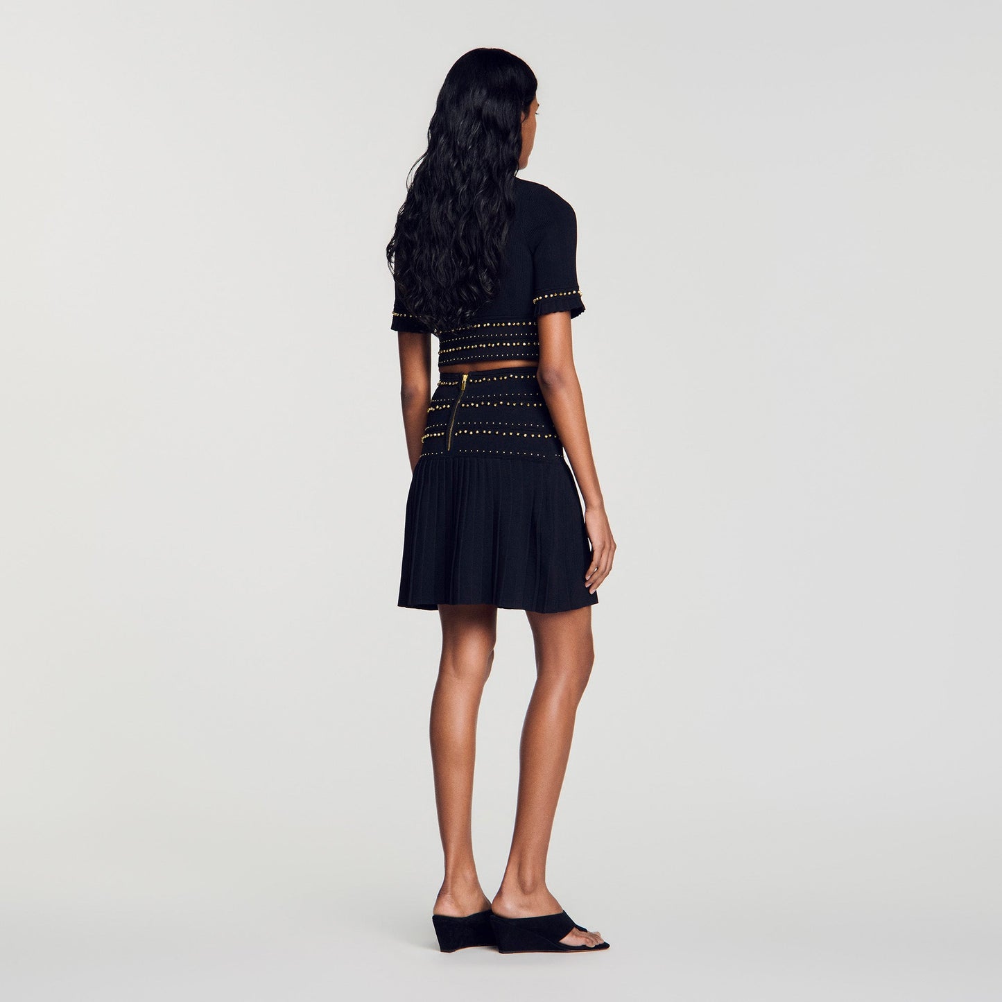 Loria Short skirt with tassels Black